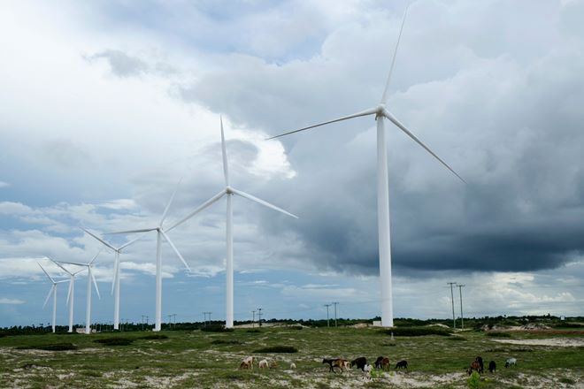 The cut in income tax rates, one of the takeaways of the Budget, might bear fruit for the renewable energy sector, experts believe. (Reuters)