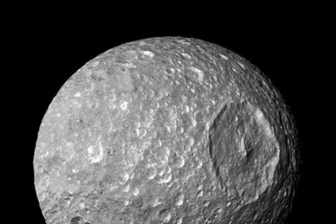 The findings, based on new data from the Cassini mission to Saturn, suggest that Dione harbours a deep ocean between its crust and core. (Reuters)