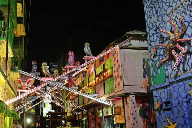 Pallishree Puja committe organised Durga puja , at North Kolkata. Theme of the puja is Beautification of Kolkata with cleaniness with Ecological Balance. Pandal surrounding residence are color with different birds ,animal insec etc, in Kolkata on Thrusday . Express photo by Partha Paul.29.09.16.