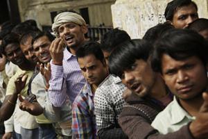 "Due to a temporary cash shortage, we see a risk that GDP growth could slow to 6.5 per cent in the fourth quarter of 2016 against our current estimate of 7.3 per cent, and to 7.5 per cent in the first quarter of 2017 from 7.9 per cent," (Associated Press)