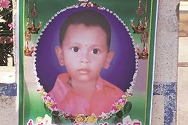 Jayawardhan’s portrait outside the school in Eduloor village. (IE photo By Sreenivas Janyala)