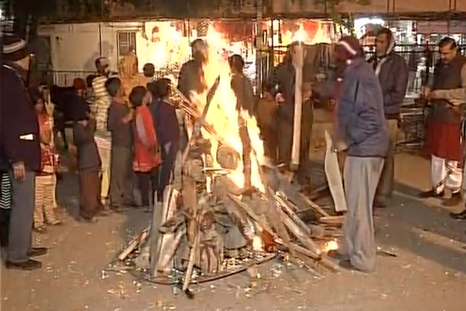 Lohri celebrations in Chandigarh, people participate in the rituals of the festival. (ANI)