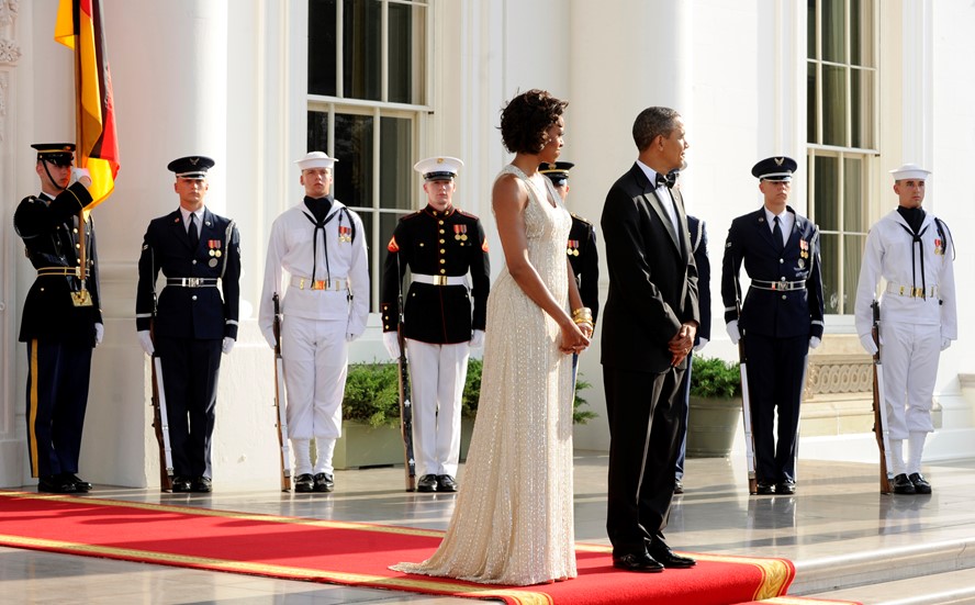 Michelle Obama Reuters 3: In 2011, during the state dinner with German Chancellor Angela Merkel, the US first lady was dressed up in a white gown designed by Naeem Khan. (Reuters)