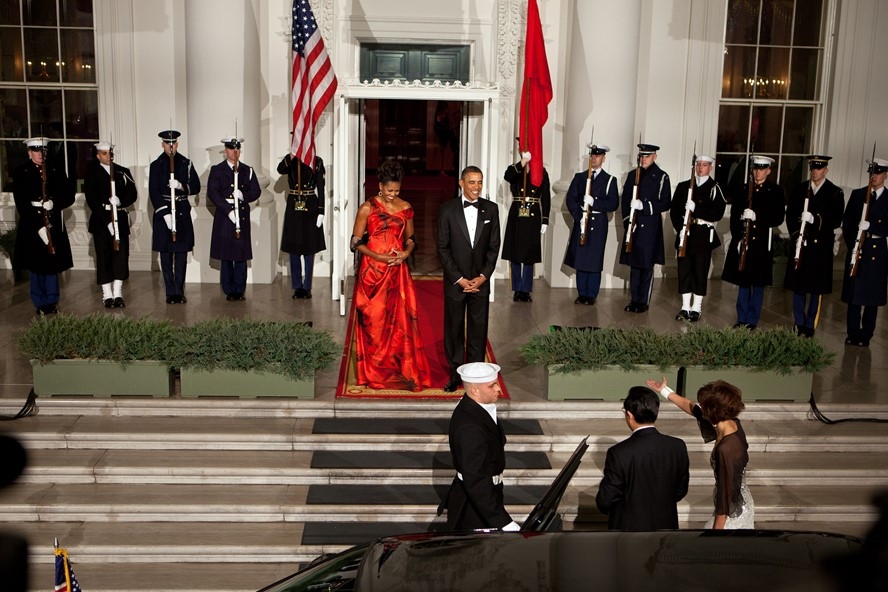 Michelle Obama_White House 4: Michelle Obama in a red gown designed by Alexander McQueen during the state dinner with the then President of China, Hu jintao, in 2011. (White House official photo)