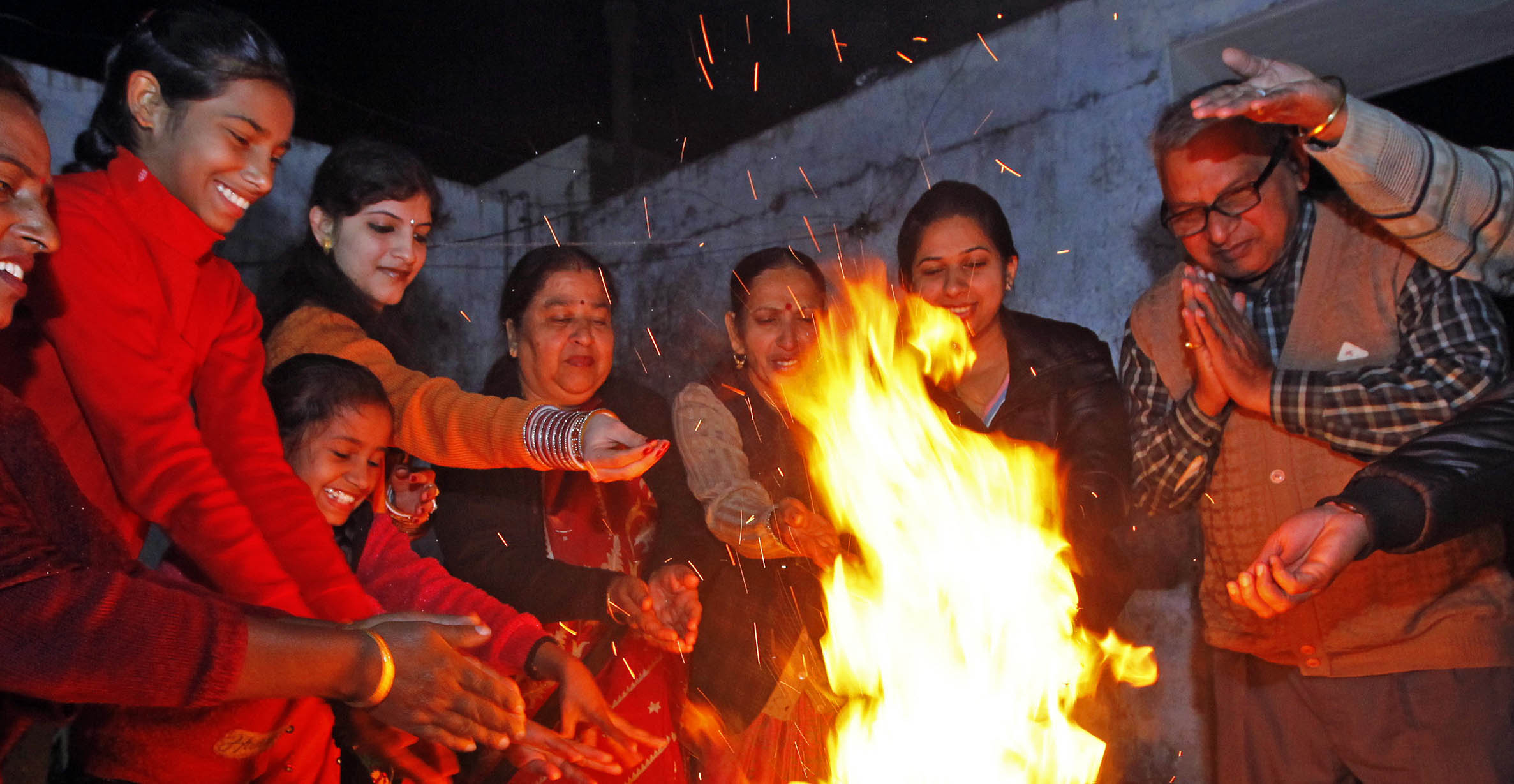 Residents celebrating festival of Lohri in Chandigarh on Sunday, January 13 2013. (Express photo by Sumit Malhotra)