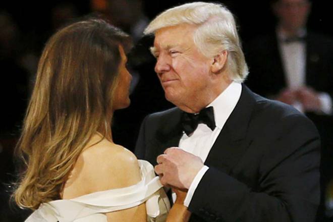 On stage, Trump said they had managed to win despite widespread doubt. "We did it," he said, exchanging a smile with his wife. (Reuters)