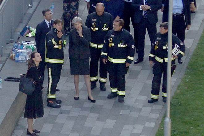 British Prime Minister Theresa May, london tower fire, london fire, Grenfell tower fire, london fire victims, support package victims