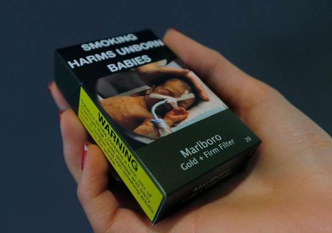 Delhi government, Philip Morris,Philip Morris International Inc, tobacco shops, remove all advertisements from tobacco shops, Marlboro cigarettes, promotional slogans, warns of legal action