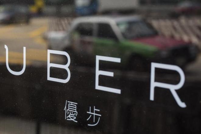 uber, Uber Technologies Inc, Travis Kalanick, Uber Technologies Inc shareholders, SoftBank Group Corp, San Francisco, Didi Chuxing