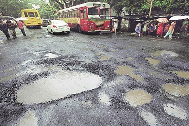 bmc pothole, bmc pothole death, mumbai pothole death, smart city mission, swachh bharat mission, india potholes, pothole problem in india, pothole accidents in india, municipal bodies, municipalities, problems of municipalities