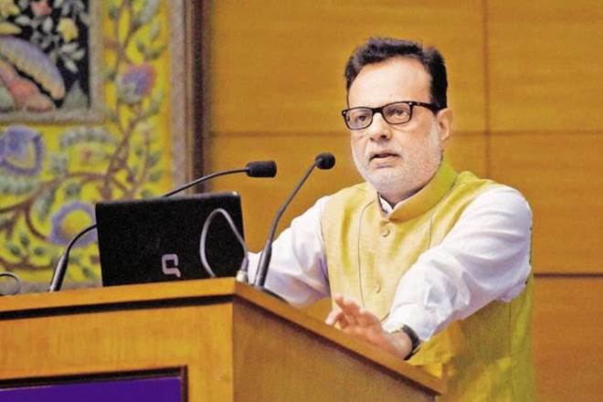 Revenue Secretary, Revenue Secretary Dr Hasmukh Adhia, Finance Ministry, Goods and services tax, GST, GST full form, GST rate, GST Council, GST rates, GSTIN, GST invoices, provisional GST ID, final GST ID, Hasmukh Adhia, credit cards, consumers, financial services, banking services, home loan processing fee, fund transfers, debit card, ATM withdrawal beyond the number of free services, issuance of cheque books/drafts/duplicate passbooks, cash handling charges and SMS alerts, what is GST, Twitter, social media,