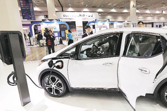 Electric vehicles charging infrastructure, EESL, Tata Motors, Mahindra and Mahindra, EVI Technologies, Exicom Power Solutions, AC chargers, Exicom
