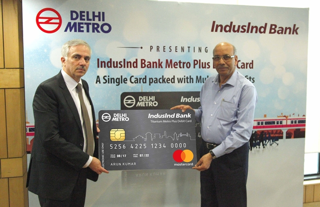 Anil Rao, Chief Administrative Officer - IndusInd Bank & Mangu Singh, MD - DMRC unveiled IndusInd Bank Metro plus Debit Card at Metro Bhawan in New Delhi on Sunday.