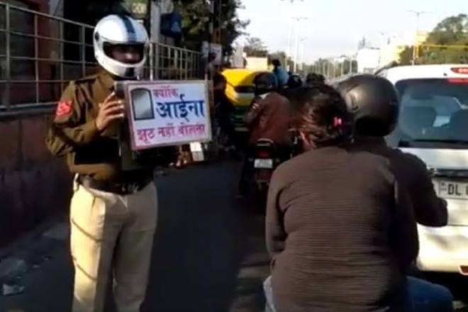 Video: What Delhi Traffic Police did to people not wearing helmets will ...