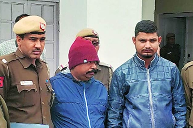 47-year-old hotel general manager Rajendra Kumar and assistant manager Vikas Kumar (21)