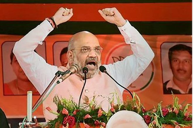 Amit Shah, BJP, election issue, parliputra lok sabha, Modi vs rahul, Rahul Gandhi holiday, lok sabha elections. amit shah rally, amit shah speech, rahul gandhi article 370, rahul terrorists, rahul kashmir, congress election manifesto, congress sedition law 