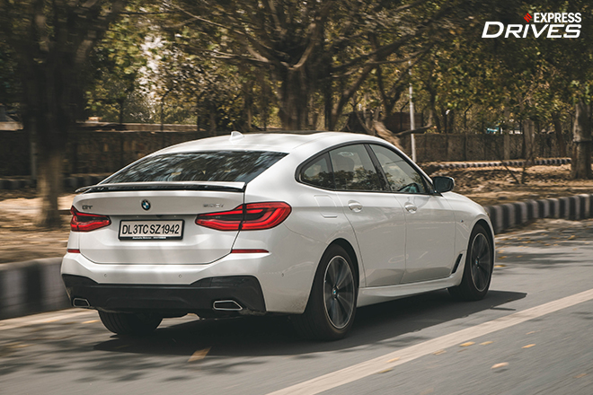 2021 BMW 630i GT driving rear