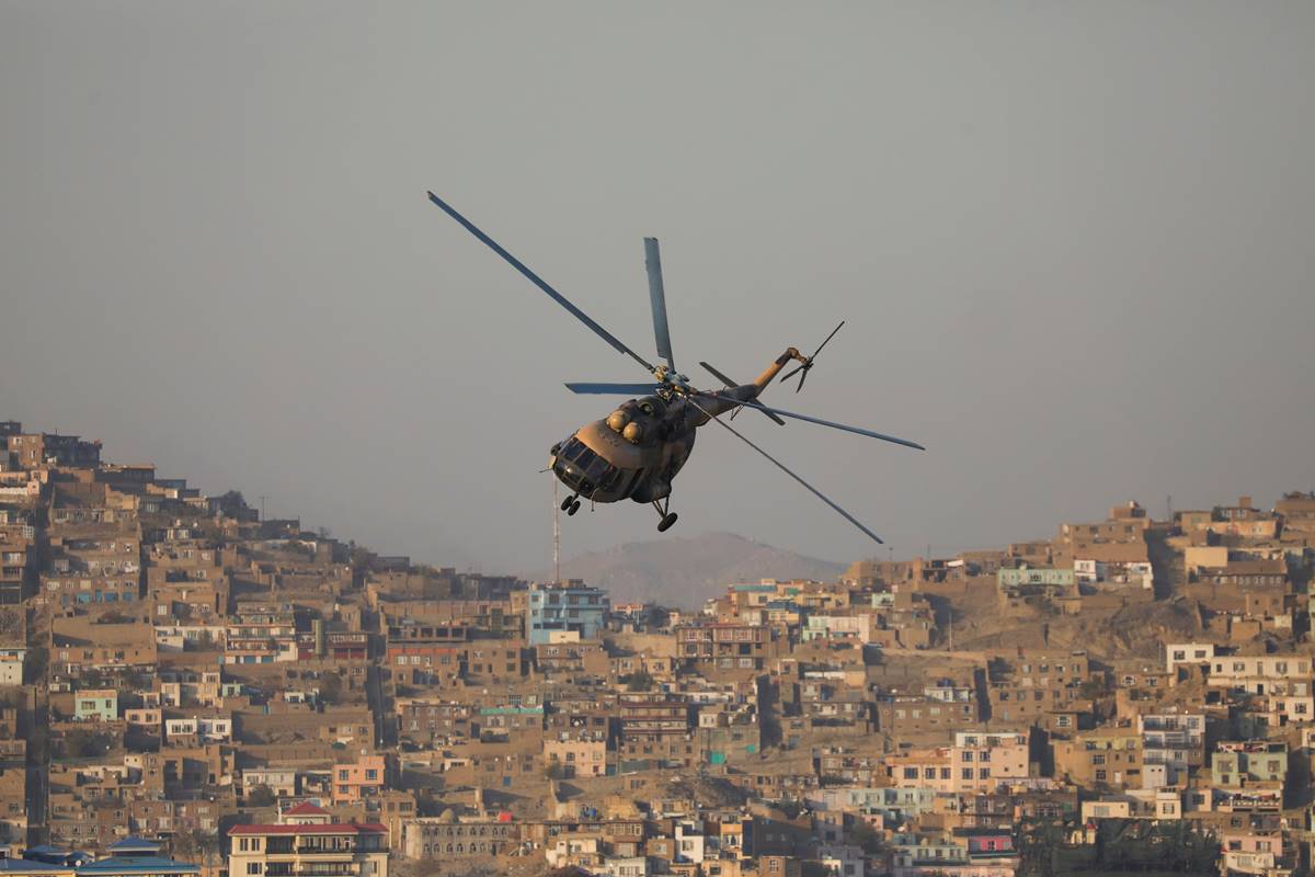 A military helicopter is pictured during the Taliban military parade in Kabul, Afghanistan. (Reuters image)